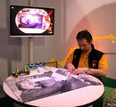 Matija doing a live building session of a portrait at the science centre VilVite in Bergen, Norway.  The portrait consists of about 6000 LEGO-pieces and it took 12 hours to put it together.